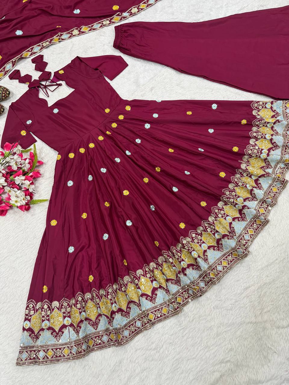 Majestic Wine Flared Anarkali Suit Set Adorned with Delicate Floral Scattered Motifs and an Ornate Heritage Embroidered Border